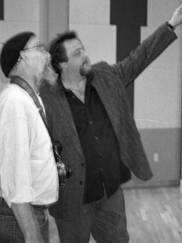 Dan Reed points out a feature to LMN Editor Paul Moffett while on a tour of the facility