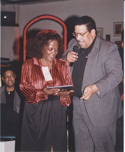 Photo of Mary Ann Fisher gets a plaque celebrating the declaration of Mary Ann Fisher Day