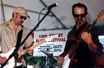 Photo of da Mudcats, Rob Pickett, guitar, Mike Lynch, bass, 10th Street Blues Festival, June 10, 2006 