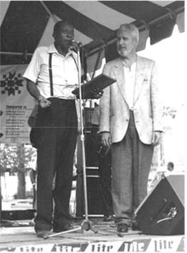 Rocky Adcosts (right) presents the first KBS Sylvester Weaver Award to Henry Woodruff 1989